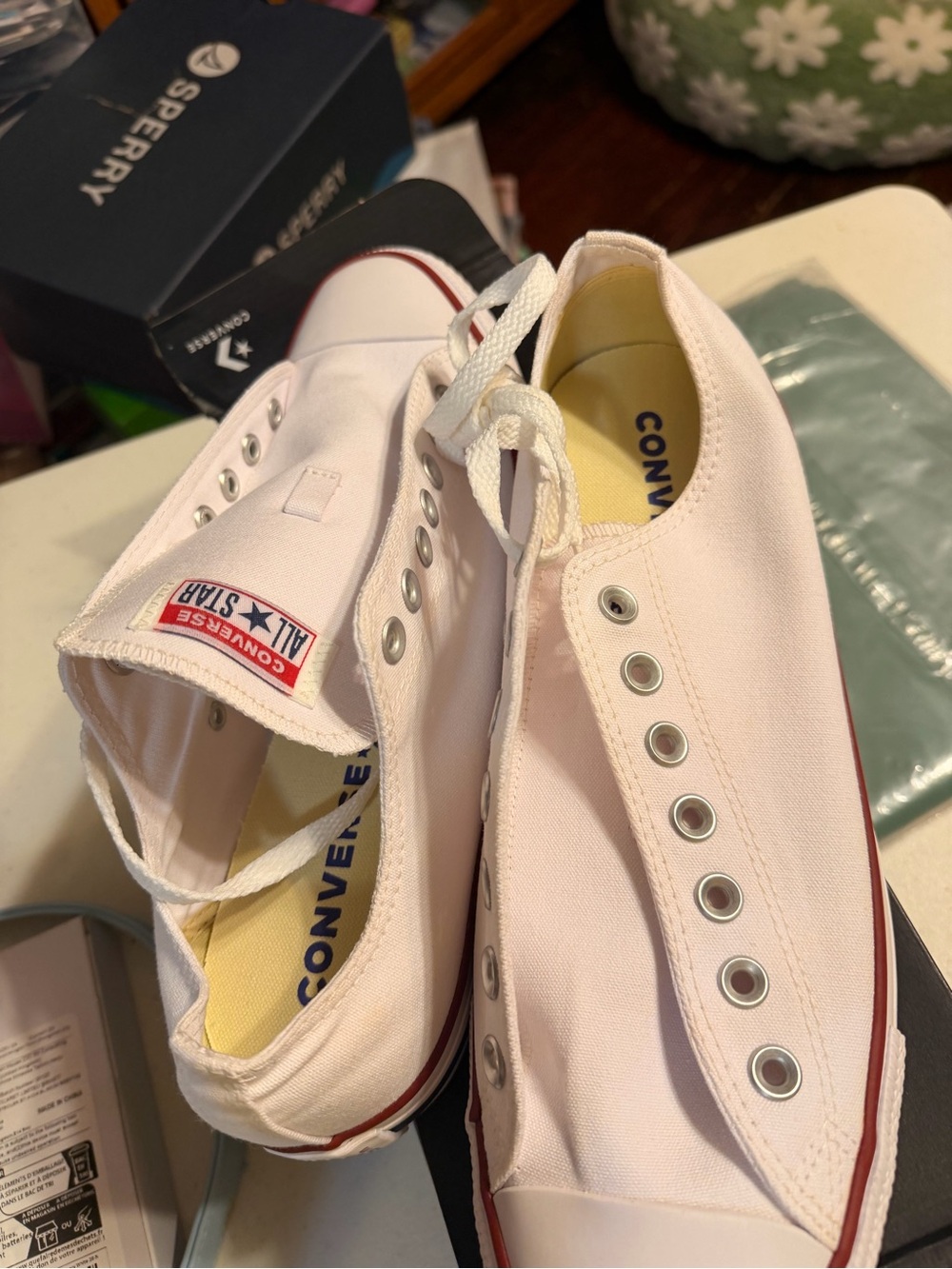 Converse Kids Slip-On Canvas Sneakers in White with Red Trim
